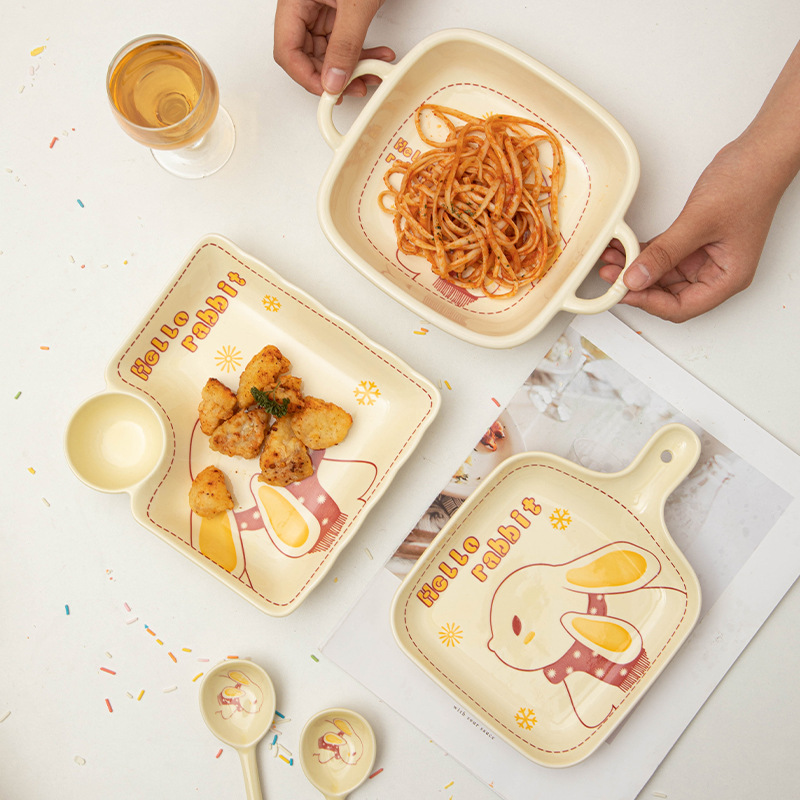 Cream style ceramic dish and cutlery set