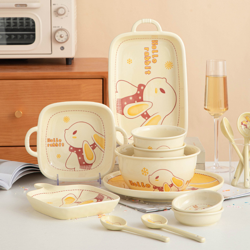 Cream style ceramic dish and cutlery set